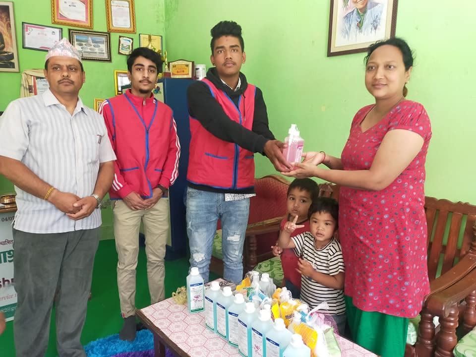 handingover-hand-sanitizer-at-baglung-2077